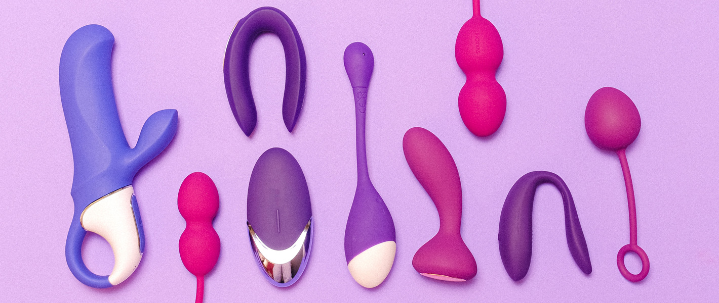 sex toys against purple background