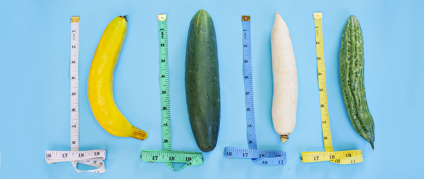 phallic fruits next to tape measurements