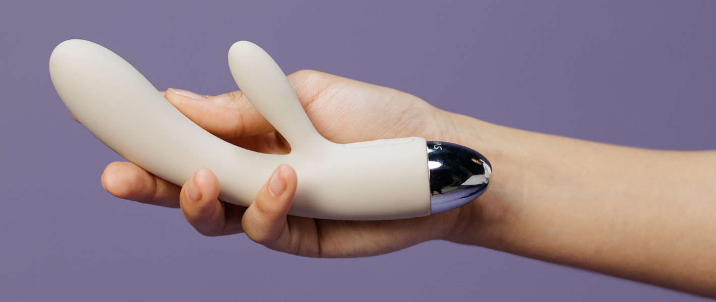 hand holding a rabbit vibrator