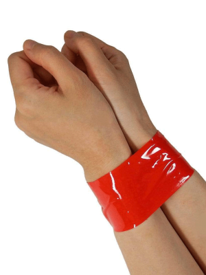 red-bondage-tape-on-hands