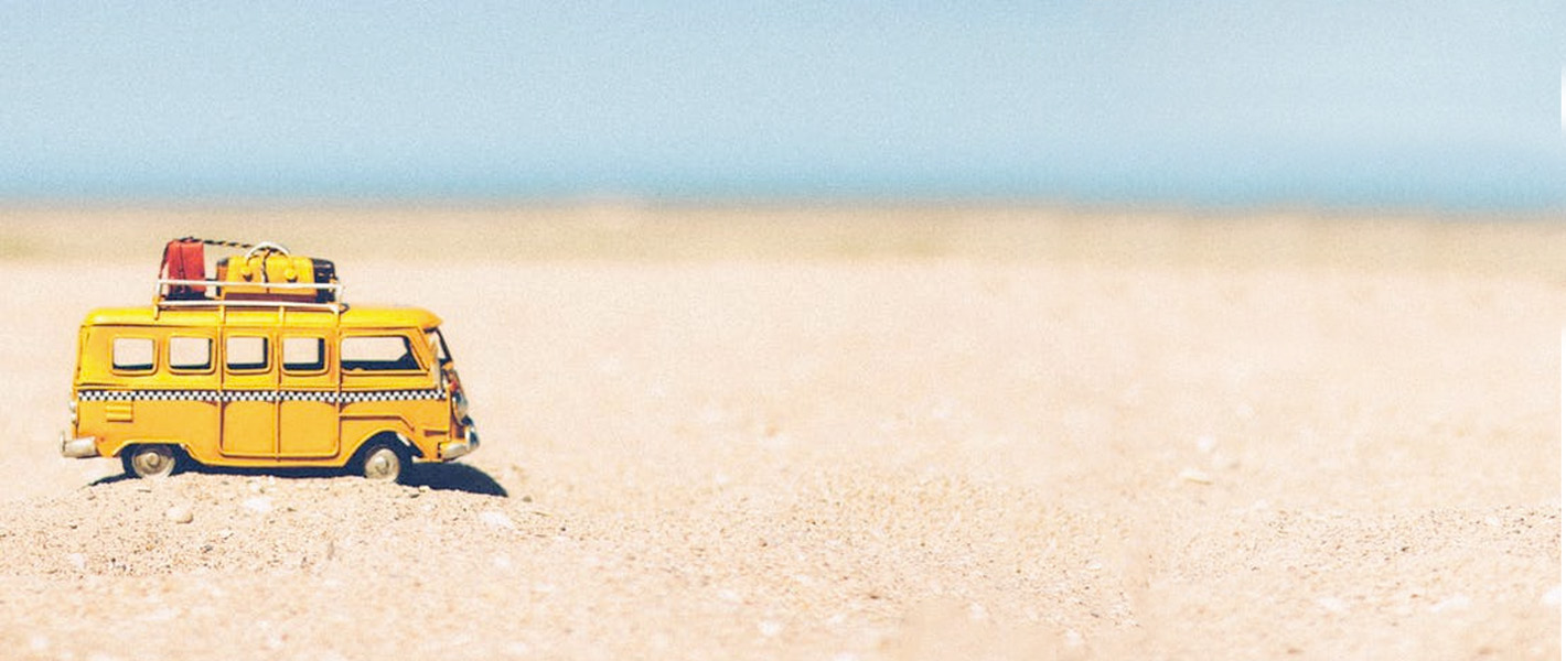 toy camper van on beach