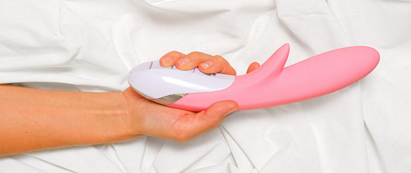 hand holding a rabbit vibrator